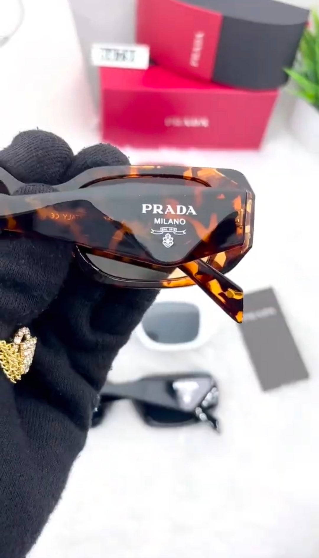 PRADA SUNGLASSES ARTICLE -3